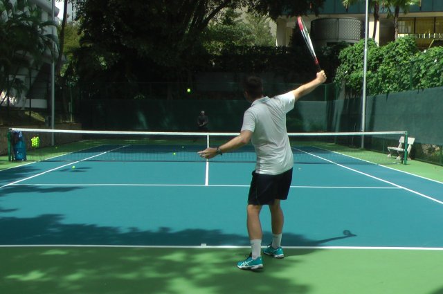 hitting tennis shot too high