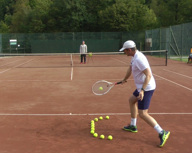tennis backhand swing path