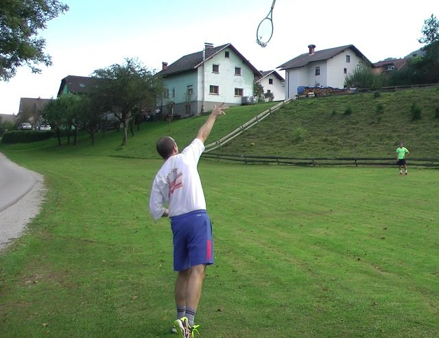 throwing a tennis racket