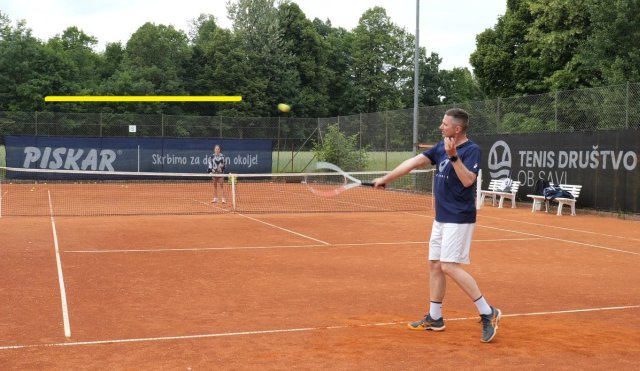 hitting a high backhand slice