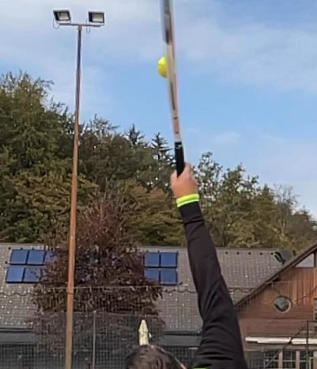 wrist at contact on topspin serve