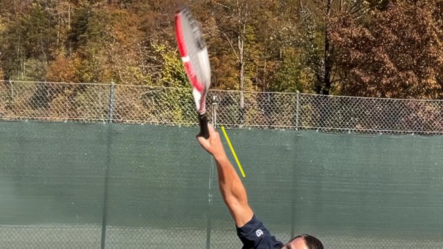 wrist position at serve contact