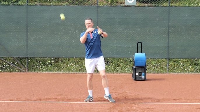 throwing tennis balls drill