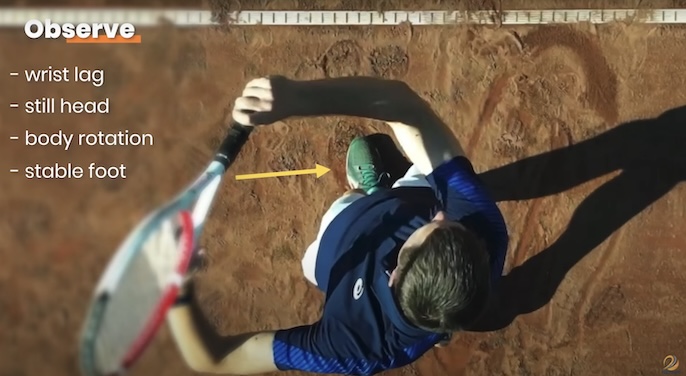 neutral stance tnnhis forehand stroke, from a drone camera